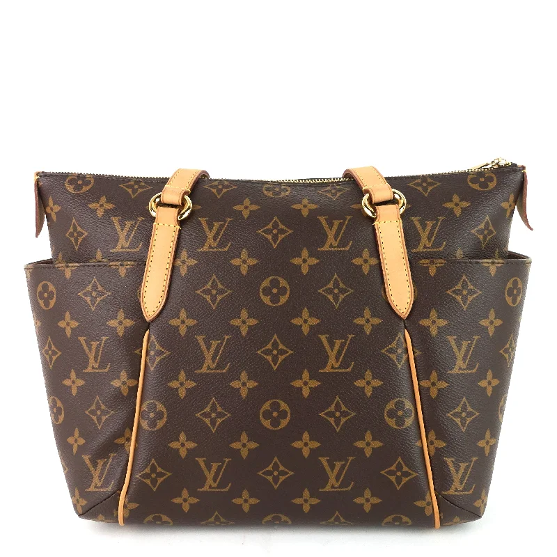 Louis Vuitton Twist bags with a contrast - colored interior for visual interestTotally PM Monogram Canvas Bag