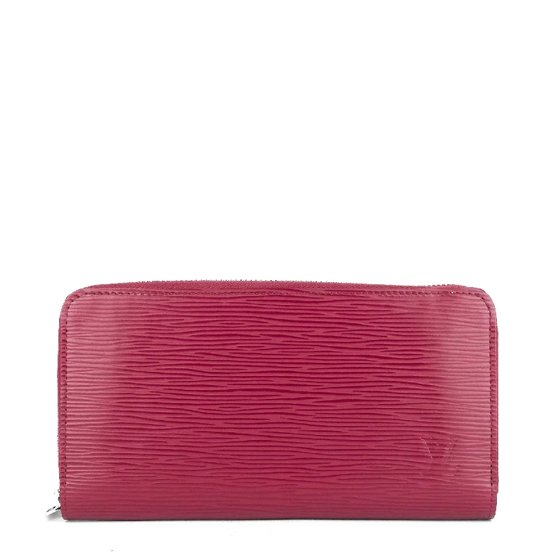 Ladies Louis Vuitton Capucines bags with a detachable shoulder strapZippy Wallet Fuchsia Epi Leather Wallet