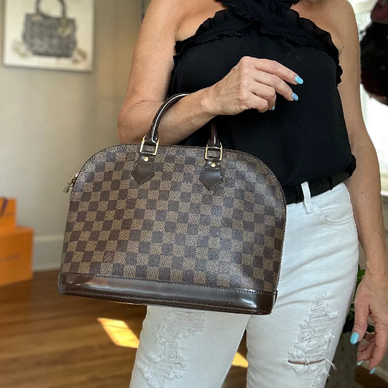 Louis Vuitton handbags with a patent - leather finish for a shiny lookLouis Vuitton Damier Ebene Alma PM Bag