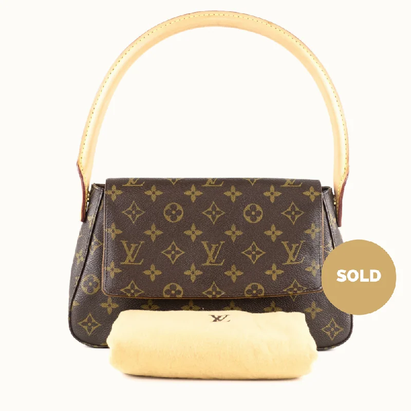 Louis Vuitton Alma bags with a monogram - embossed leather surfaceMini Looping Handbag