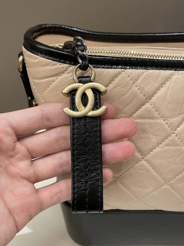 Chanel Designer Handbag with Unique DesignChanel Quilted Gabrielle Hobo Beige / Black Aged Calfskin