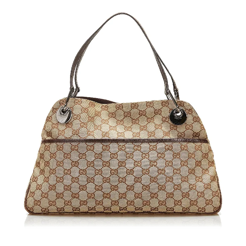 Women Gucci crossbody bags with a woven leather strapGucci GG Canvas Eclipse Tote