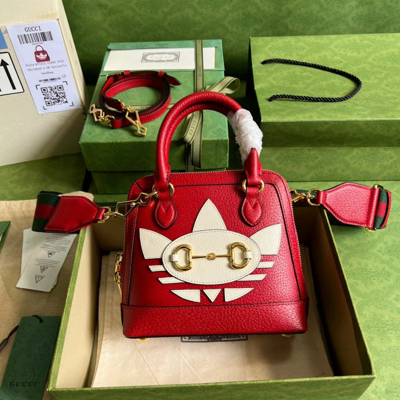 Women Gucci bags with a snap - button closure and a decorative charmBC - GUCCI BAGS - 1430