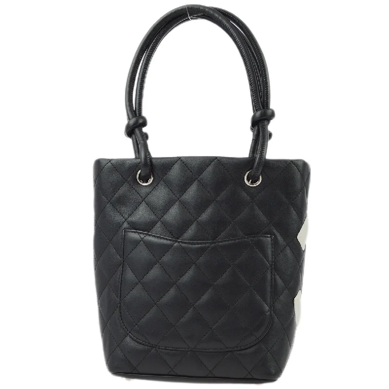 Chanel Quilted Leather Shoulder Bag for FashionistasChanel Black Calfskin Cambon Ligne Tote Handbag