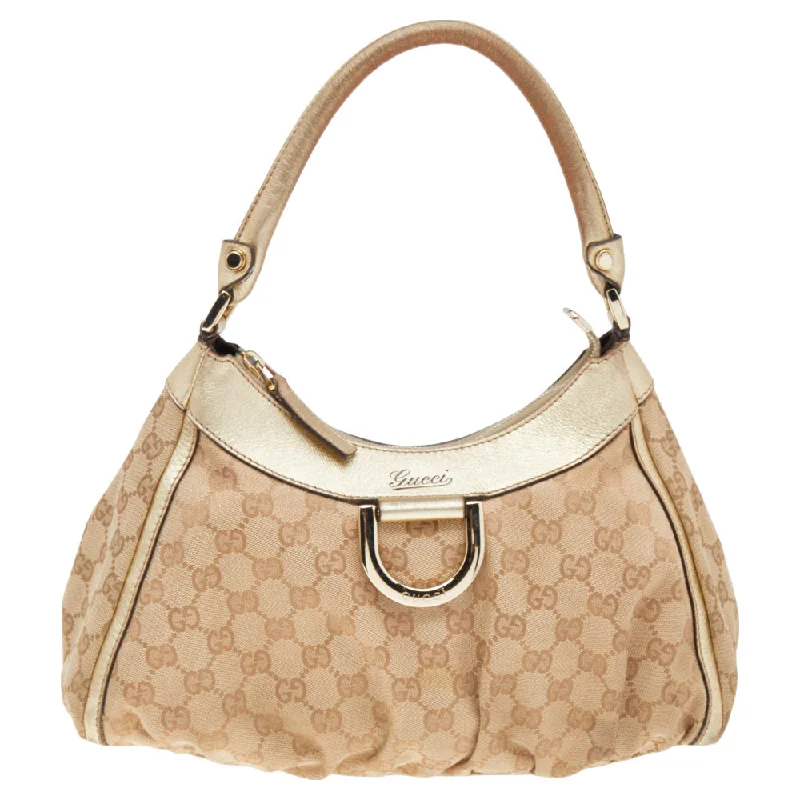 Ladies Gucci Dionysus bags in a pastel colorGucci Beige/Gold GG Canvas And Leather D Ring Hobo