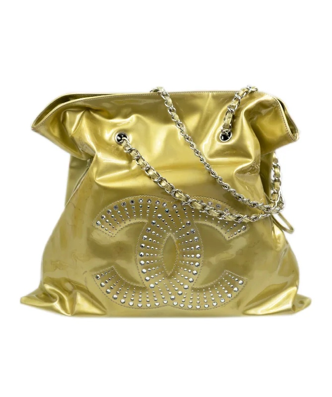 Chanel Designer Handbag with Unique DesignChanel vinyl gold tote bag with large CC logo crystal diamante detailing. AGC1371