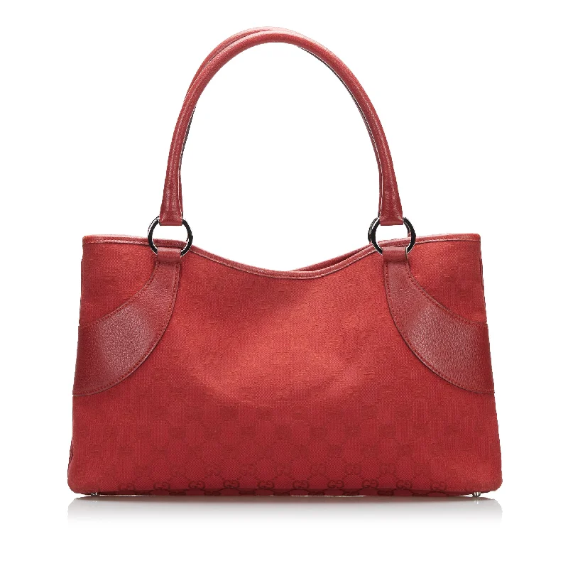 Ladies Gucci Dionysus bags with a star - shaped charmGucci GG Canvas Tote Tote Bag