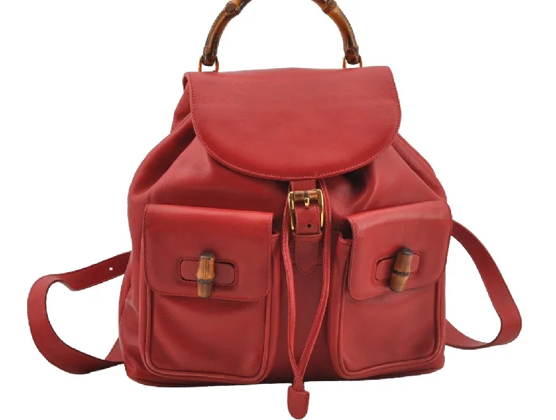 Women Gucci crossbody bags in a bold red colorAuthentic GUCCI Bamboo Vintage Drawstring Backpack Leather Red 8442I