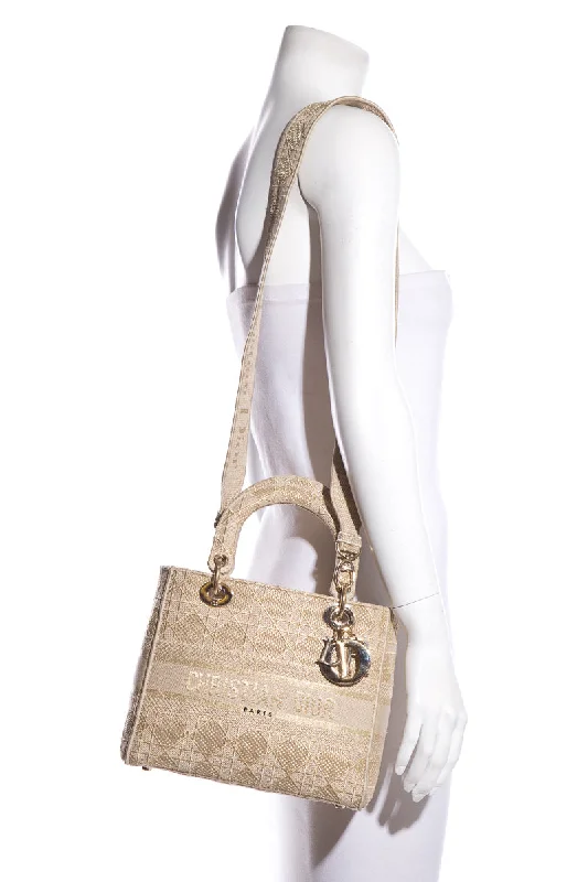 Christian Dior handbags with a snap - button closure and a decorative buckleChristian Dior Tan & Gold Lady Dior Knit Handbag