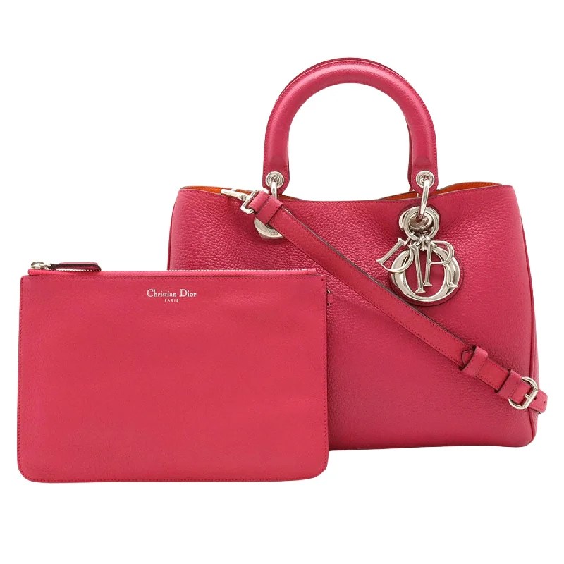 Contemporary Christian Dior handbags with a unique shapeDior Diorissimo Tote