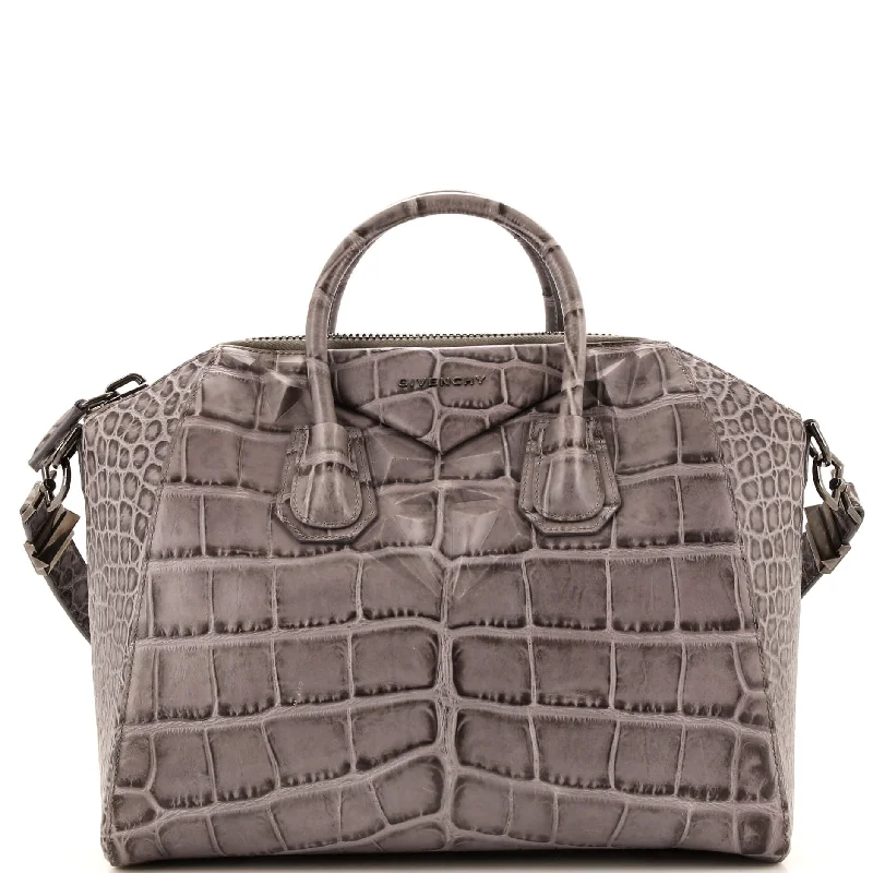 Christian Dior handbags with a snap - button closure and a decorative buckleAntigona Bag Crocodile Embossed Leather Medium